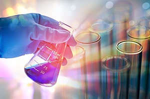 Pouring solutions in Chemistry lab