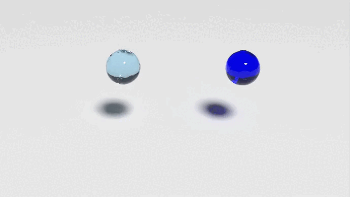 An animation of 2 balls of fluid dropping and filling a container. The first ball looks transparent like water and splashes rapidly and fills the bottom of the container. The ball on the right is dark blue and slowly spreads out on the bottom of the container.