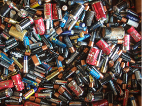 A wide assortment of used batteries.