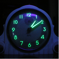 Alarm clock with glow-in-the-dark numbers.